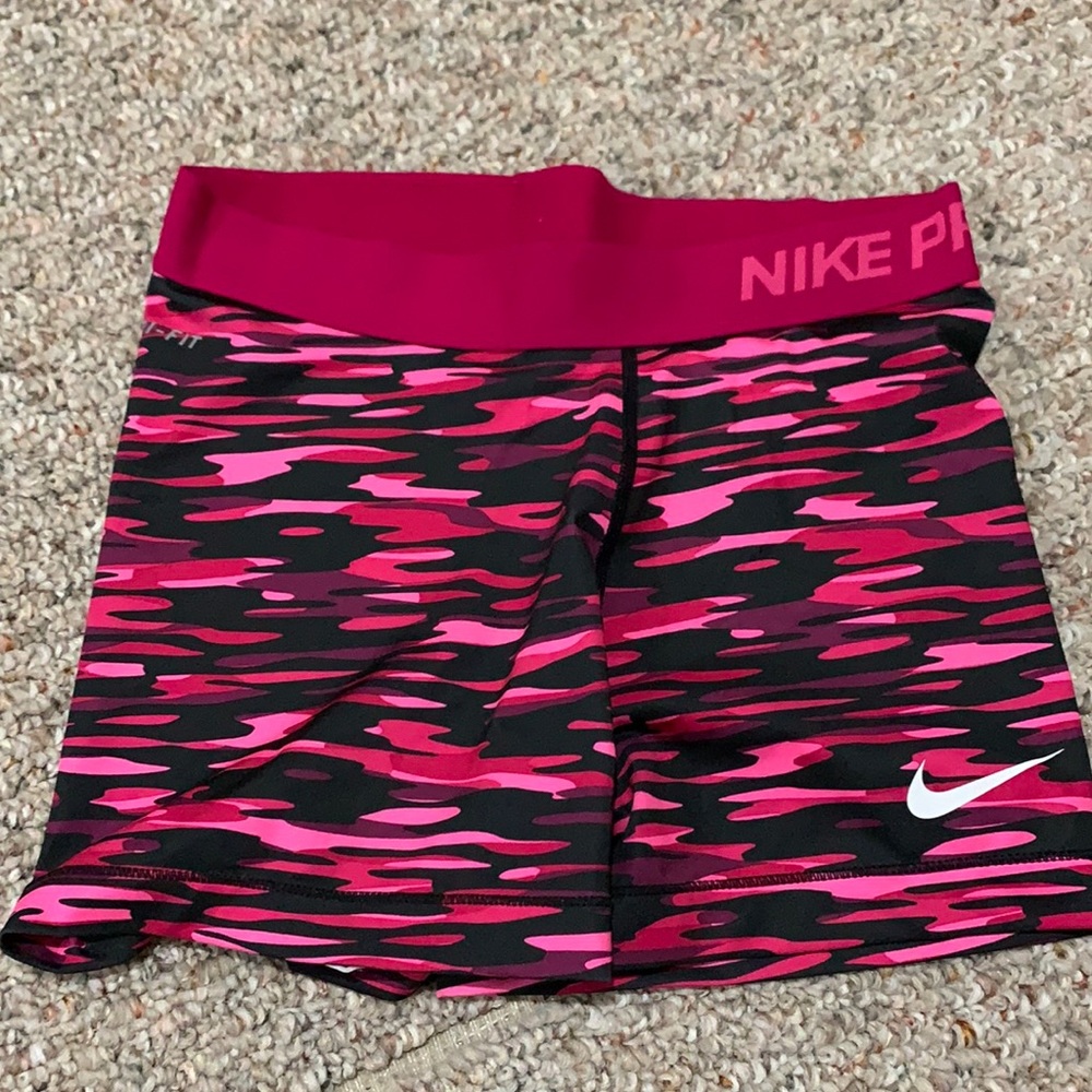 Pink camo Nike Pros